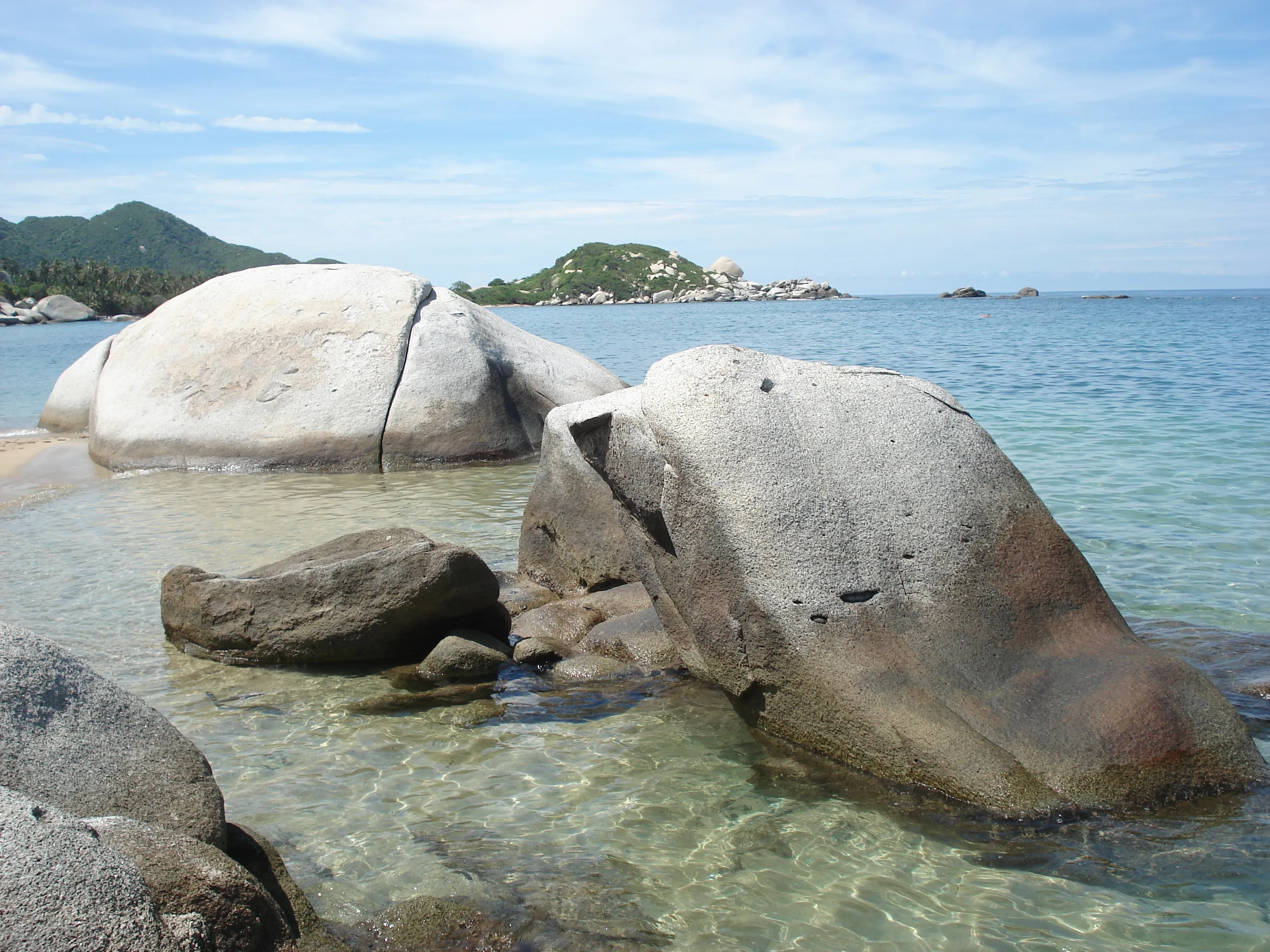 Massive Smooth Granite Boulders Resting in the Calm, Shallow Waters